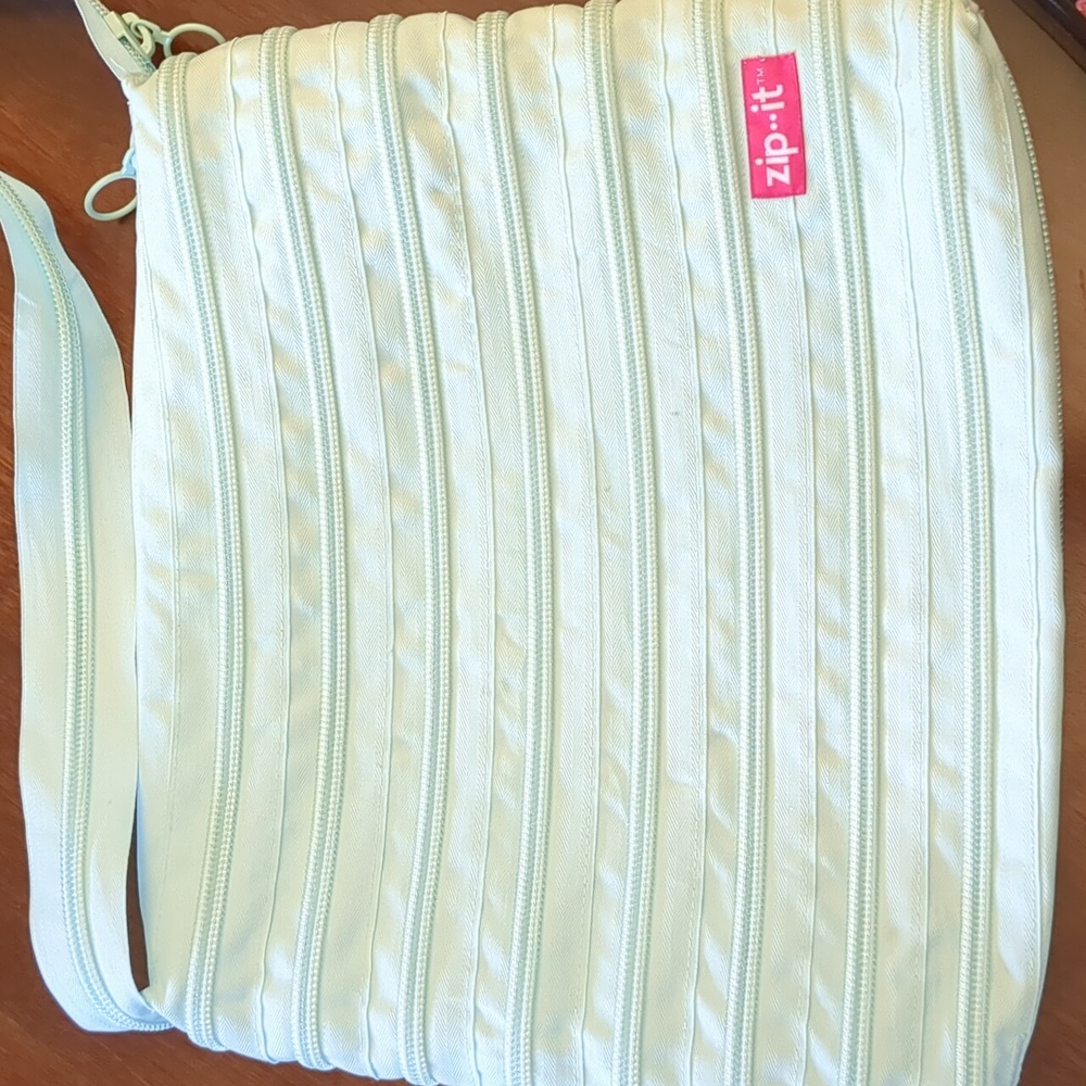 Zip It, mint green purse